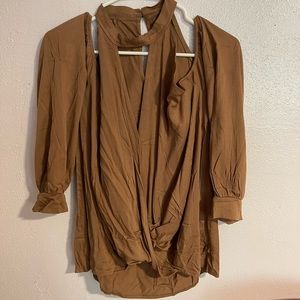 Crossed from the front brown blouse